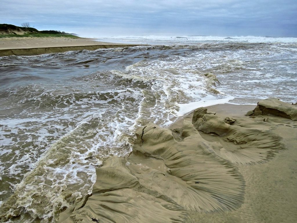 BREAKAWAY: Lake Arragan and Cakora Lake broke out to the sea at Brooms Head after the east coast low hit. BREAKAWAY: Lake Arragan and Cakora Lake broke out to the sea at Brooms Head after the east coast low hit.